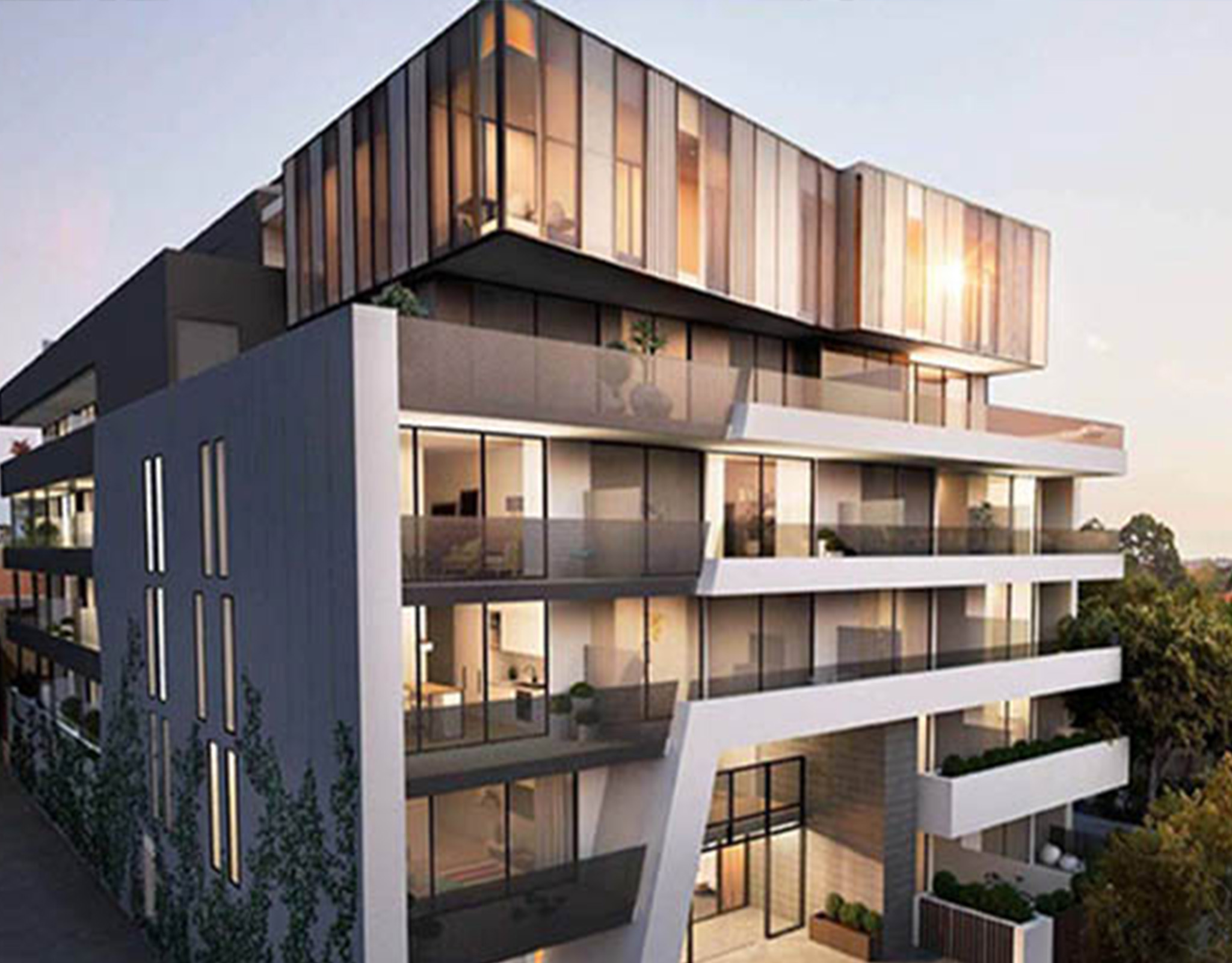 Dusk rendering of an angular residential building with cantilevered volumes and glazed corners
