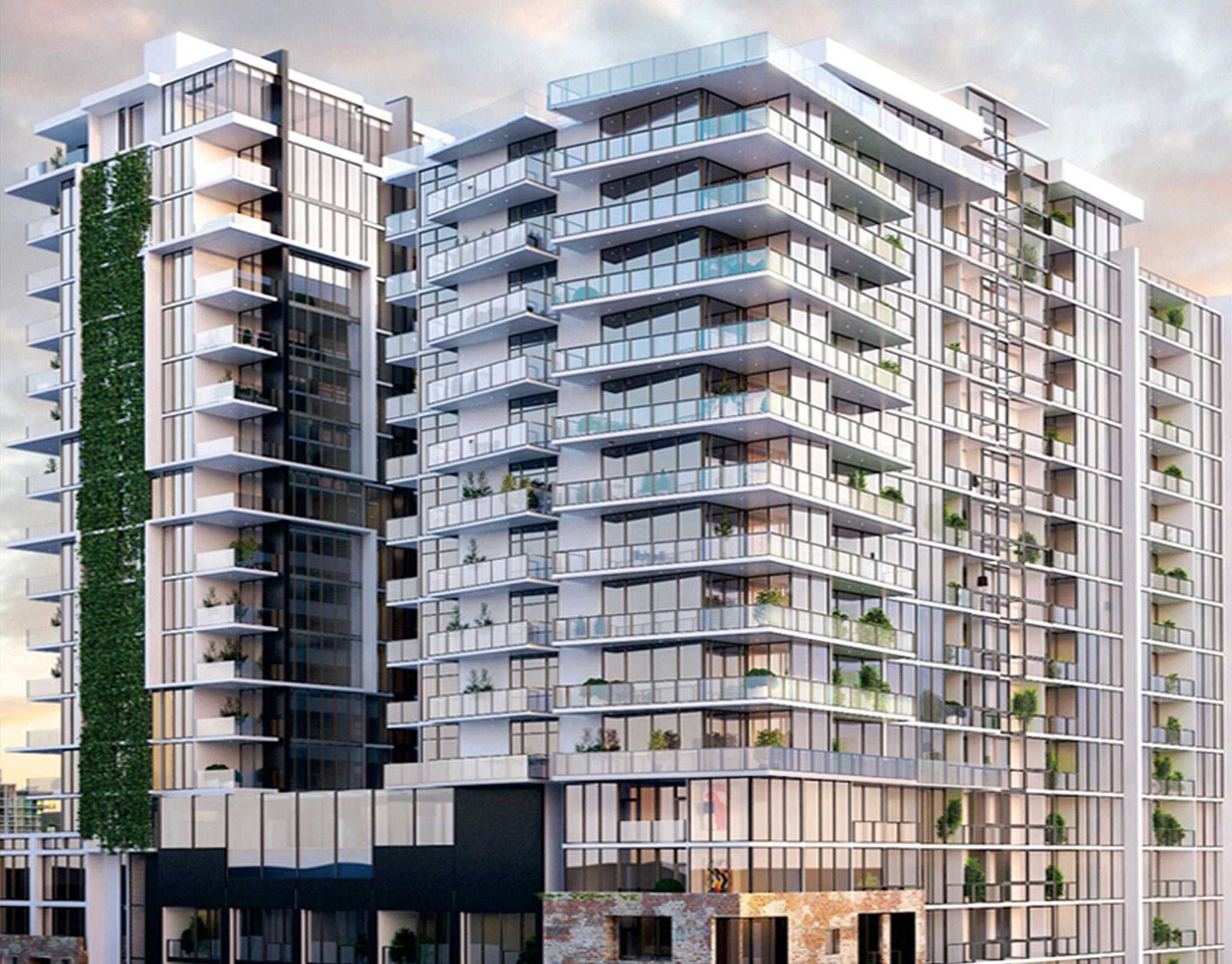 Rendering of a residential tower with planted terraces cascading down a fully glazed facade